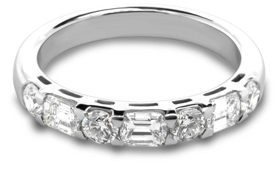 Round and emerald diamond ring