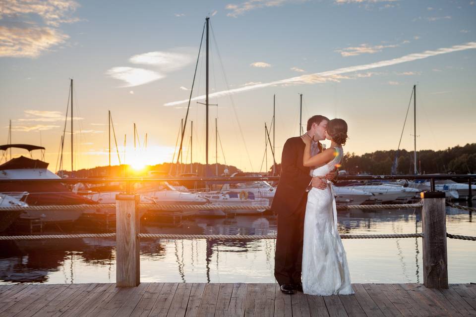 Couple kissing at sunset