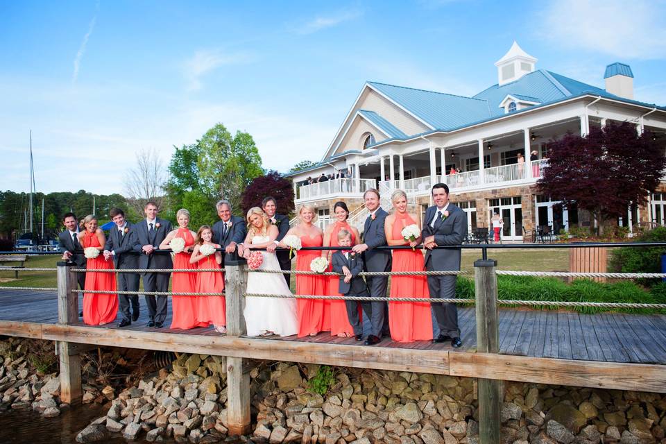 The couple with the bridesmaids and groomsmen