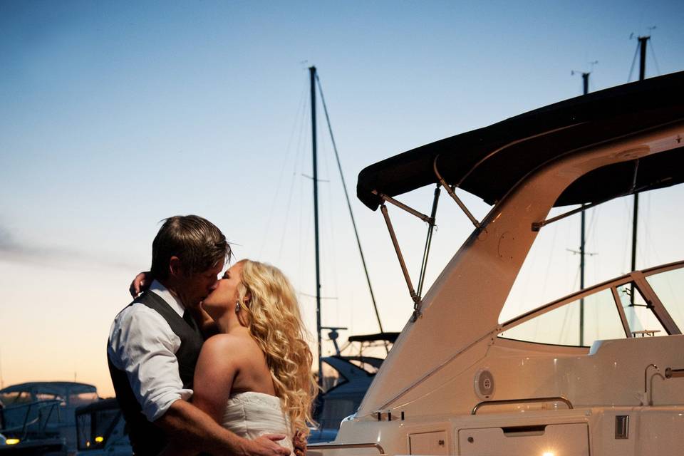 Couple kissing on boat