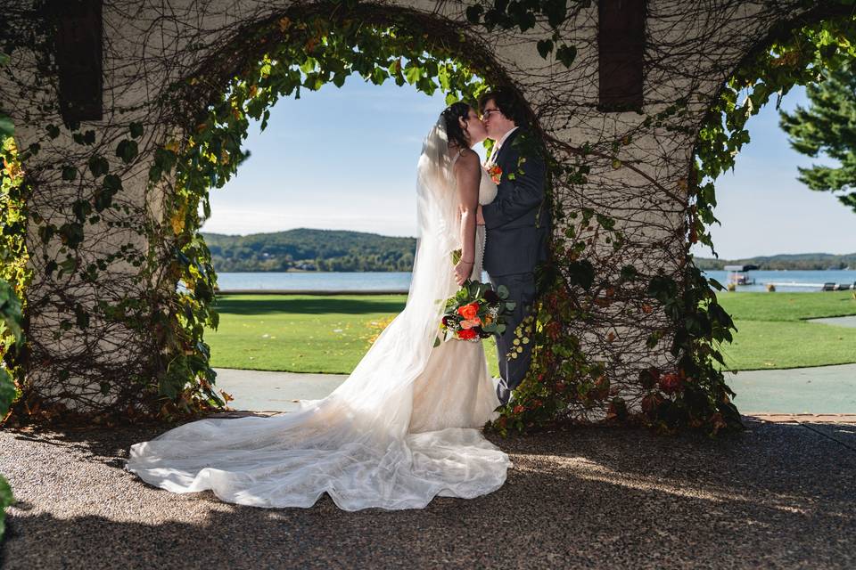 Portraits under ivy archway