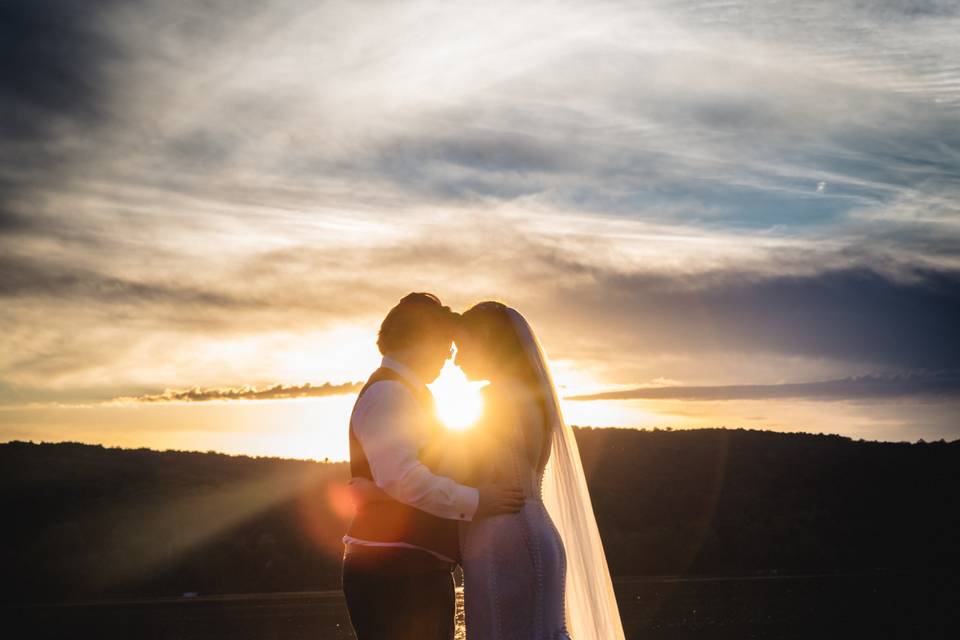 Bride and groom at sunset