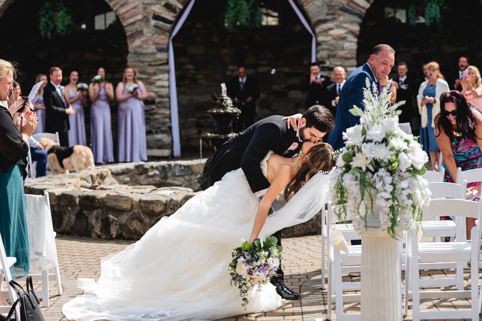 Newlyweds kiss at ceremony
