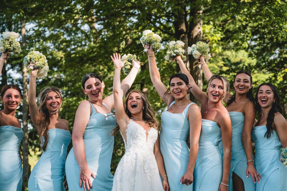 Bridesmaids throw bouquets