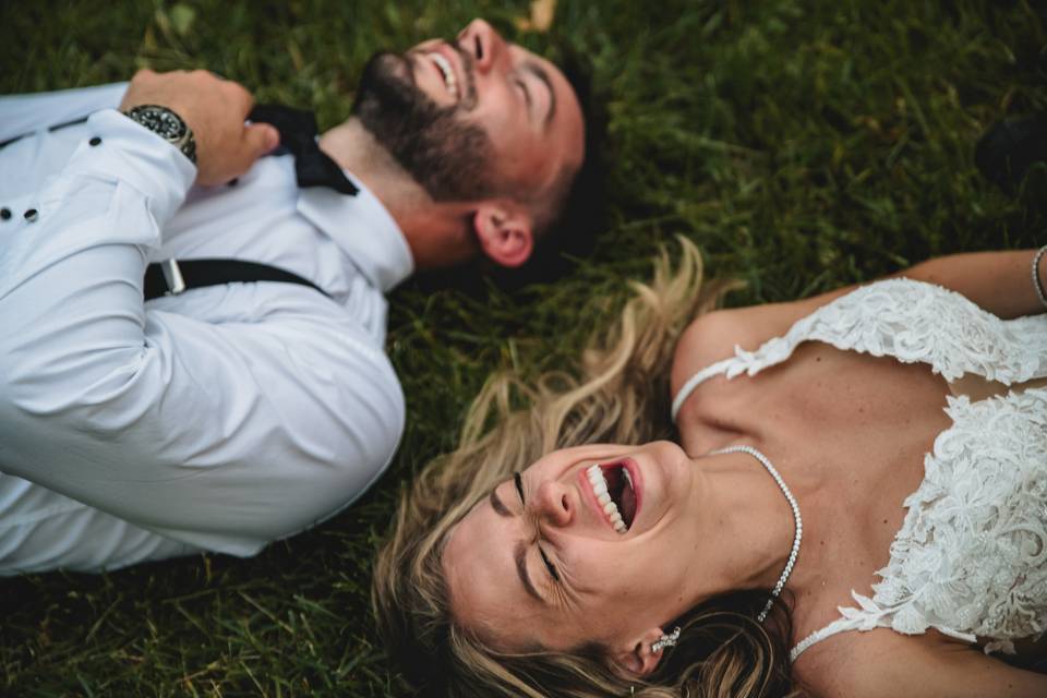 Newlyweds laughing together