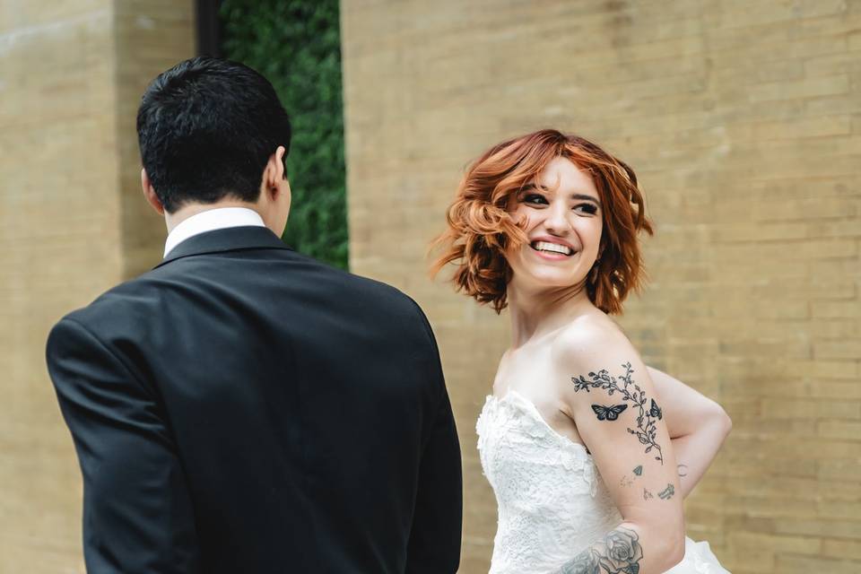 Smiling bride runs with groom