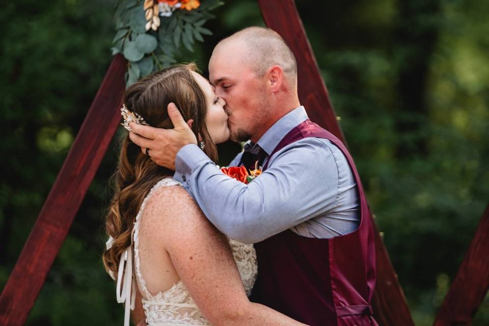 Newlyweds share a first kiss