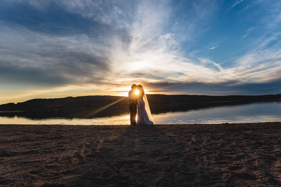Newlyweds dance on the beach