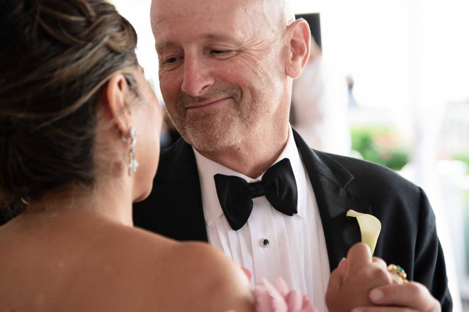 Grooms parents dancing