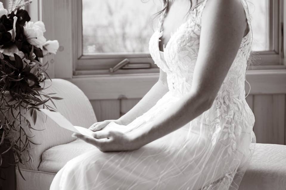 Reading letter from groom