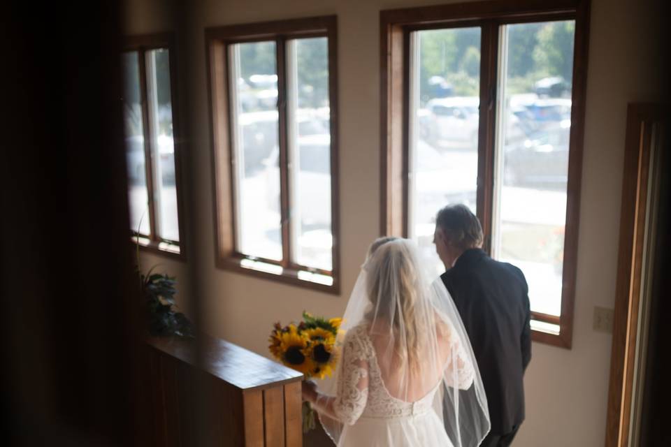 A bride walks to her ceremony