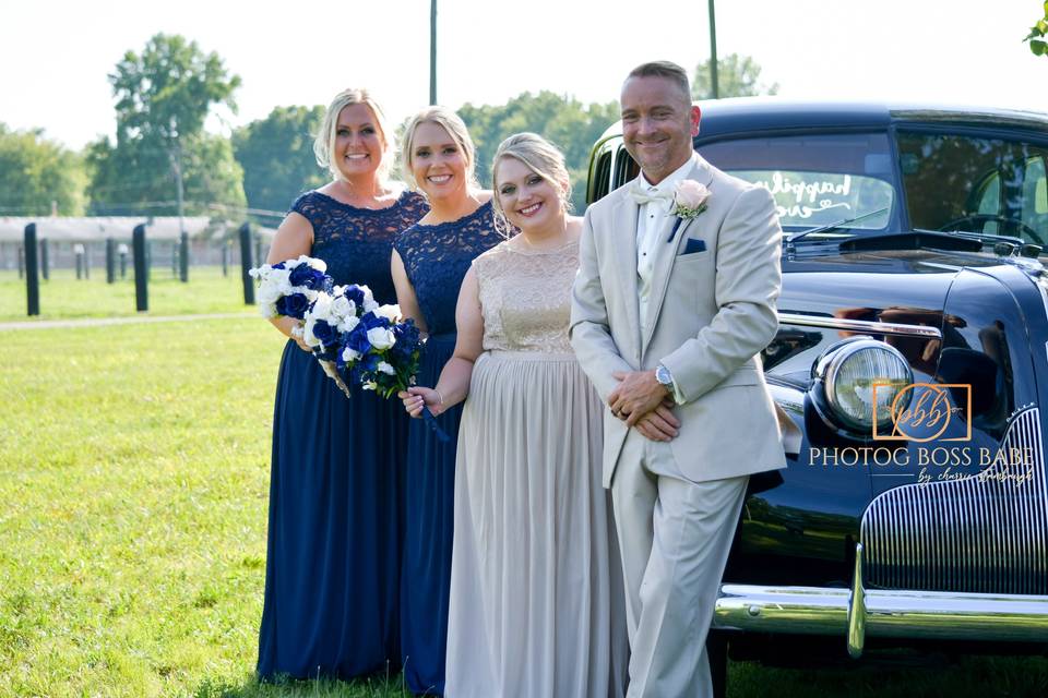 Bridesmaid with groom.