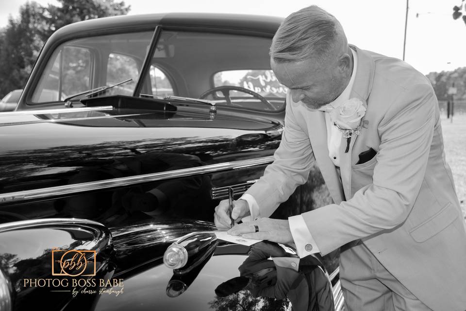 Groom signing certificate.