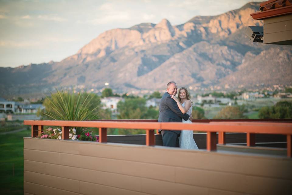 Couple posing with mountain vista