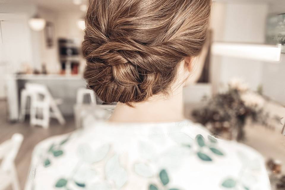 Textured twisted low bun