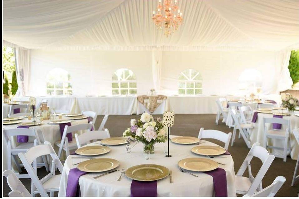 White reception tent with linen