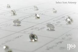 Hand selecting loose diamonds