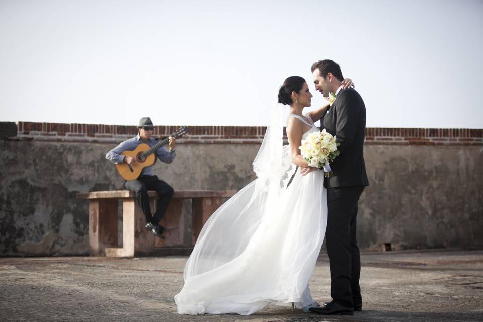 Cristabel and  Smajo at the San Cristobal Fort in Old San Juan, Puerto Rico  beign seranted by Pancho Irizarry a Spanish guitarist