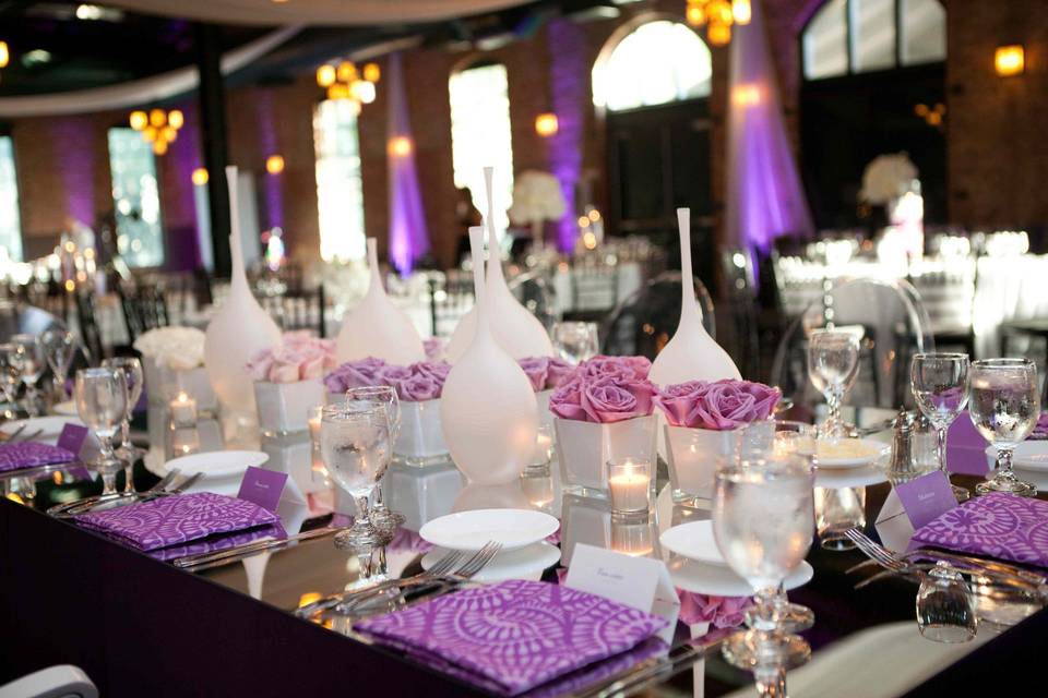 Purple ombre head table with custom napkins and blown glass vases.
copyright: Kelly Brown Weddings