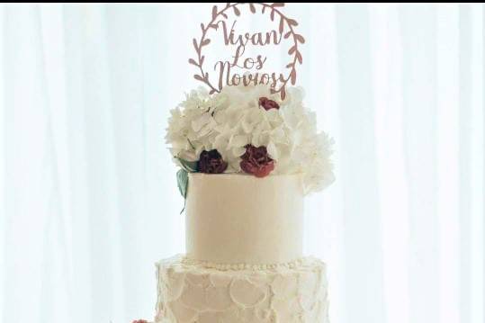 White buttercream and red rose