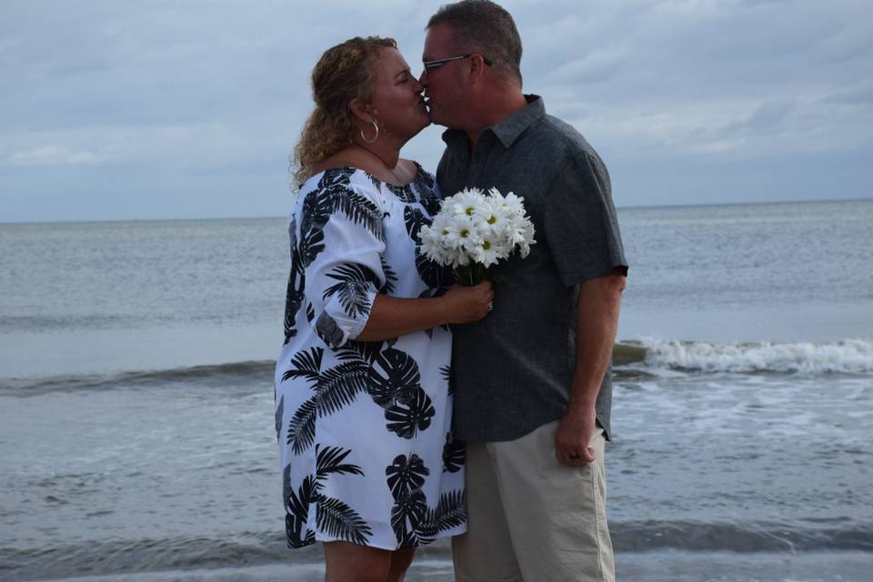 Kissing at the beach