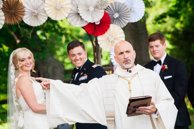 Outdoor colorful unique ceremony with bride and groom.