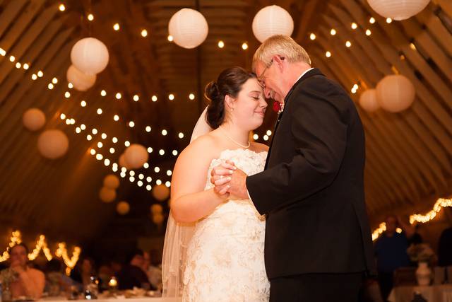 Father and daughter dance at the Indiana  indoor reception.