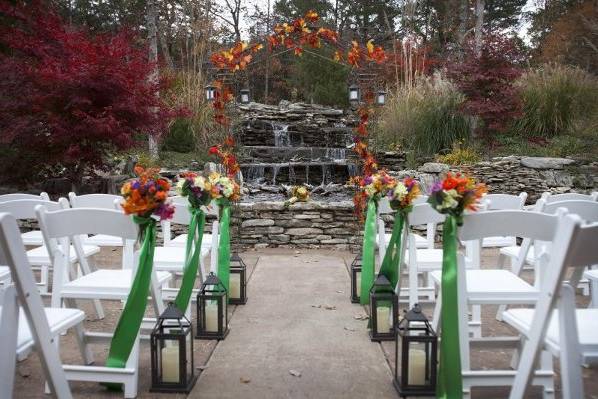 Autumn ceremony in front of one of many water features at the resort
