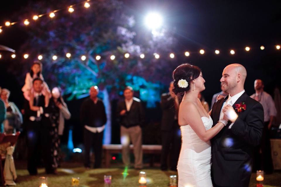 Stacy & Brian dance under the lights.  Photo by Mike Larsen.