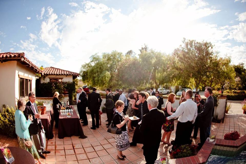 Cocktail reception in the front fountain area.  Photo by Mike Larsen.