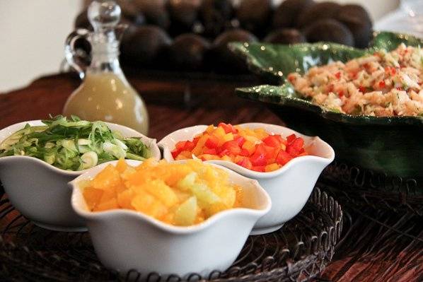 For this vegan reception, Mitchell's created a baby avocado bar. Baby avocados were split and drizzled with fresh lime. The avocados were accompanied by fresh fruit, diced peppers, scallions and shrimp and crab salad (for the carnivores).Photo by Spots of Time Photography