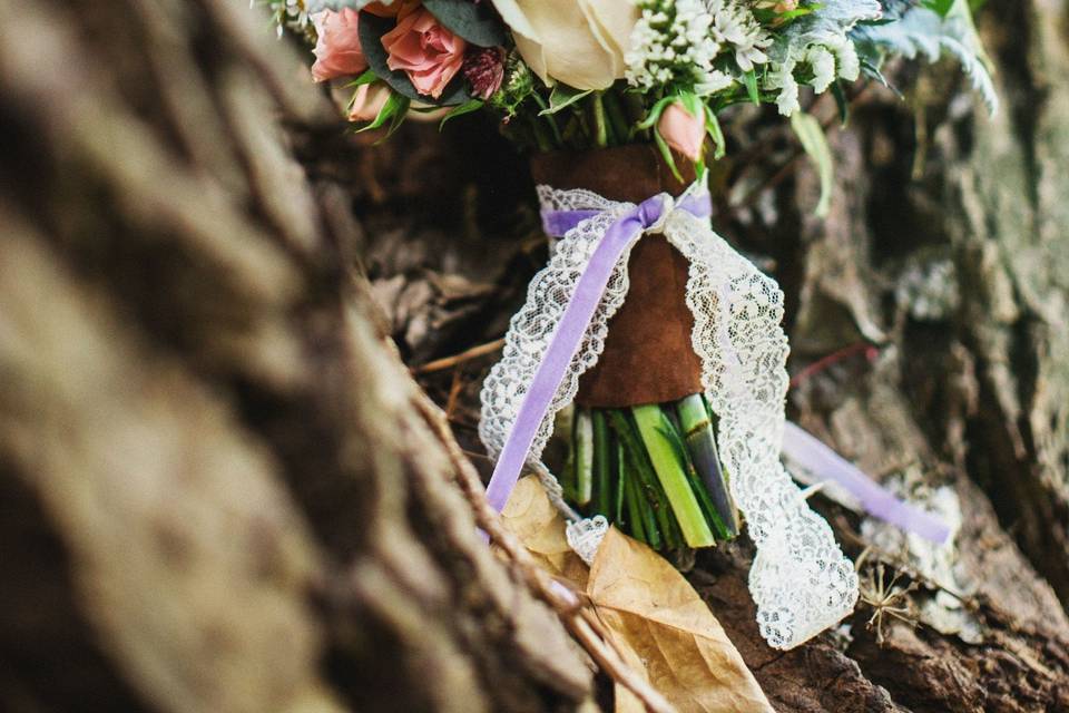 A little bit of everything including cruelty-free feathers and dried lavender for this vegan bride.