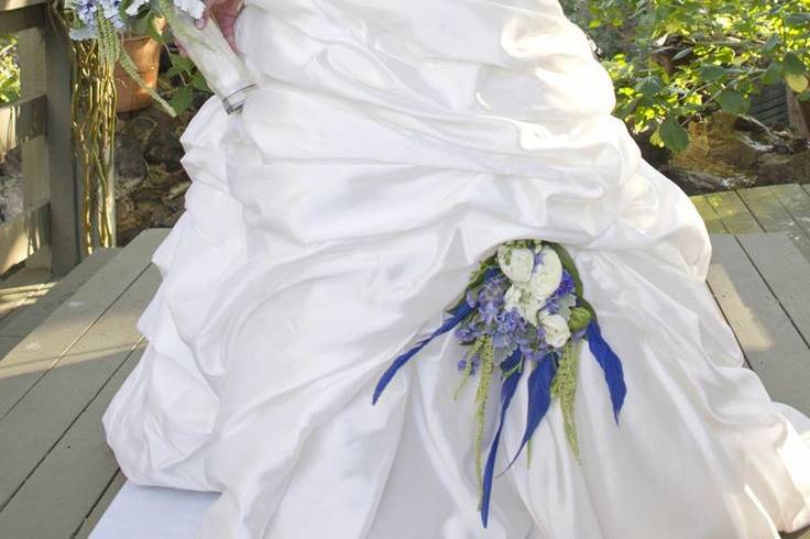 Beautiful bouquet in periwinkle, white, and green.