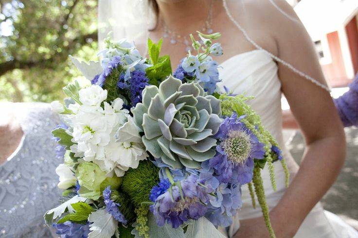 Beautiful bouquet in periwinkle, white, and green.