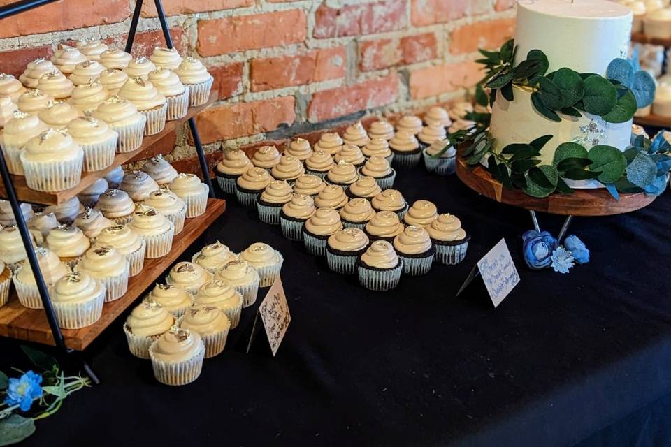 Wedding cake and cupcakes