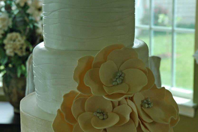 Modern and elegant, this wedding cake stands on its own.