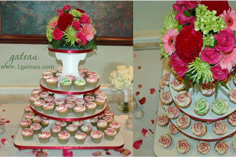 Burgundy rose swirl cupcakes, with two distinctive lime green rose swirl cupcakes for the Bride and Groom, taking the place of a cutting cake.