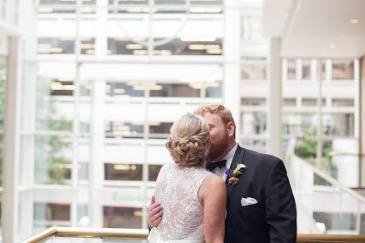 Kiss on the Atrium Balcony