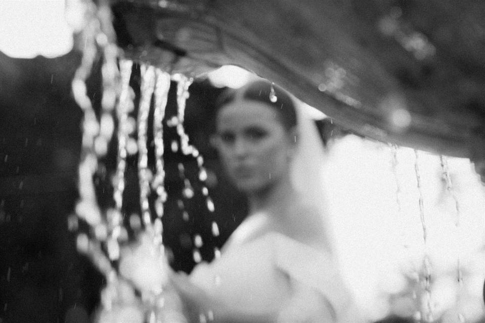 Bride by water fountain