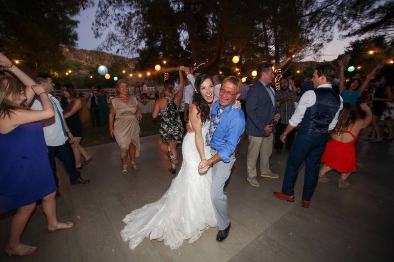 Newlyweds and their guests on the dance floor