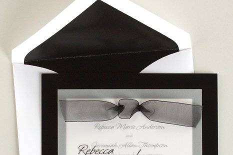 Sheer Class Wedding Invitations
AV646
This classy wedding invitation features your names in the typestyle shown on a sheer vellum overlay embellished with a sheer bow.
http://www.theamericanwedding.com/shopping/prod_detail/main.asp?pid=6944