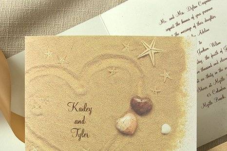Shells of Love Wedding Invitations
AV940
Seashells and starfish adorn this beach-inspired invitation. Your first names are printed on the front and the card opens to reveal your invitation wording.
http://www.theamericanwedding.com/shopping/prod_detail/main.asp?pid=5684