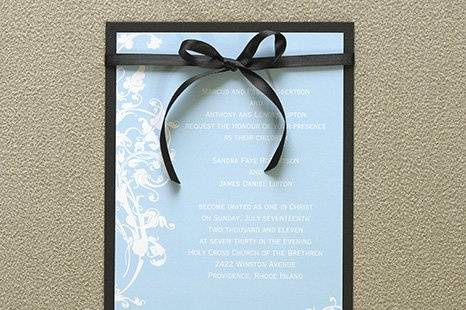 Venetian Romance Wedding Invitations
AV1110
Delicate vines and leaves, reminiscent of Venetian ironwork, adorns this simple, yet elegant invitation. Your invitation wording is printed on your choice of Blue or Green medium-weight cardstock. This card is then attached to a Black backer and ties together with a Black satin ribbon.
http://www.theamericanwedding.com/shopping/prod_detail/main.asp-pid-6610