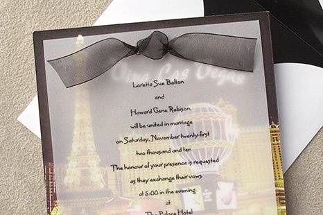 Viva Las Vegas Wedding Invitations
AV887
Let the bright lights of Las Vegas be the backdrop for your destination wedding. The colorful design is printed on heavyweight cardstock. A sheer vellum overlay is imprinted with your words of invitation or announcement. Its all tied together with a sheer black ribbon.
http://www.theamericanwedding.com/shopping/prod_detail/main.asp-pid-5770