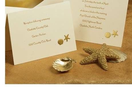 Sand and Sea Wedding Invitations
AV254
This sand colored, adorable ocean themed invitation shines with a glorious gold foil starfish and shell.
http://www.theamericanwedding.com/shopping/prod_detail/main.asp-pid-422