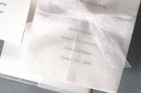 Translucent Hearts Wedding Invitations
AV182
This lovely invitation features a wrap printed with white hearts. Open it to reveal your message.
http://www.theamericanwedding.com/shopping/prod_detail/main.asp-pid-419