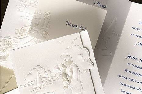 Sail Away Wedding Invitations
AV1047
Send your guests to the sea with beautiful trifold wedding invitations. Embossing makes these invitations something they'll want to keep.
A charming scene of picturesque sailboats and seaside romance is embossed on the front and middle panel of tri-fold wedding invitations. Your names are printed on the center panel and your invitation wording is on the third panel.
http://www.theamericanwedding.com/shopping/prod_detail/main.asp-pid-5849