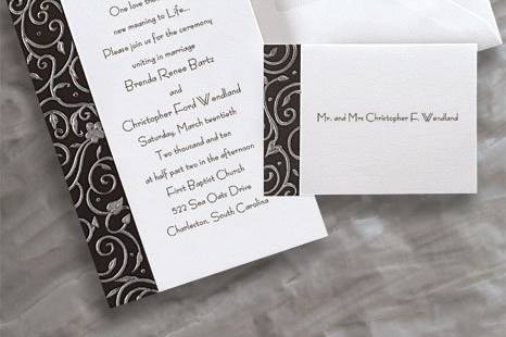 Polished Perfection Wedding Invitations
AV1197
Exquisite White foil embossed florals accentuate the front of this elegant invitation. A lavish 1 1/2