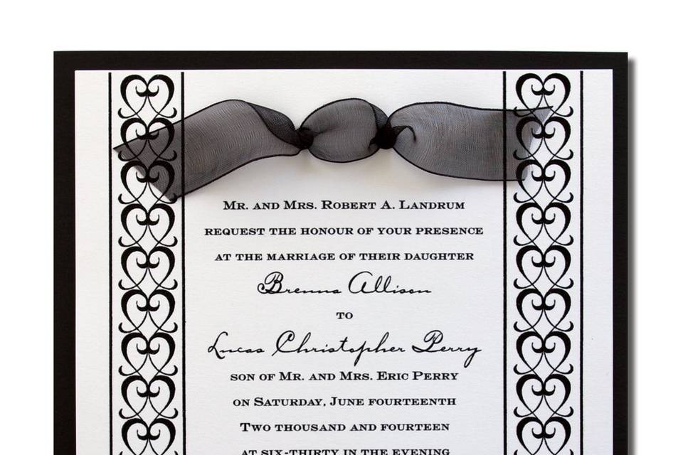 Double Hearts AV427
Two embossed platinum hearts adorn this invitation making a simply elegant statement about your approaching wedding.