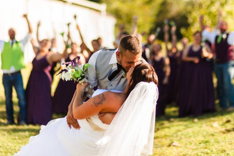 Bride and groom kissing - Derek Coffman Photography